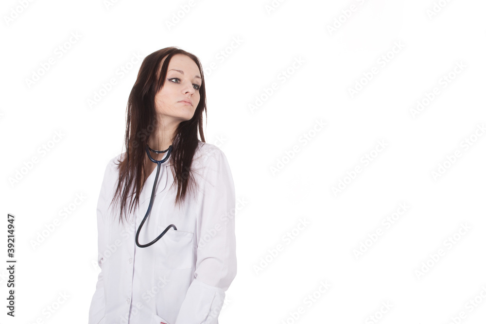 Standing woman doctor with stethoscope in a white robe. Standing woman doctor with stethoscope in a white robe.