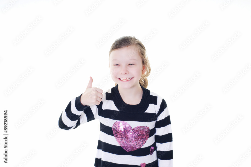 young girl giving a thumbs up sign young girl giving a thumbs up sign
