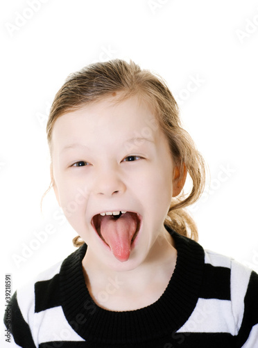 young girl sticking her tongue out