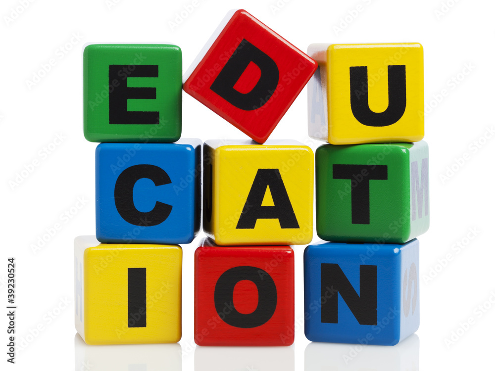 Education spelled with stacked alphabet building blocks Education spelled with stacked alphabet building blocks