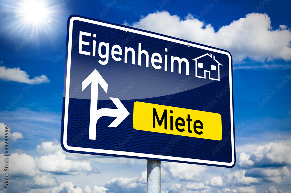 Ortseingangsschild blau mit Eigenheim und Miete Ortseingangsschild blau mit Eigenheim und Miete