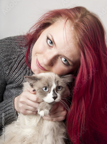 Young girl with a cat