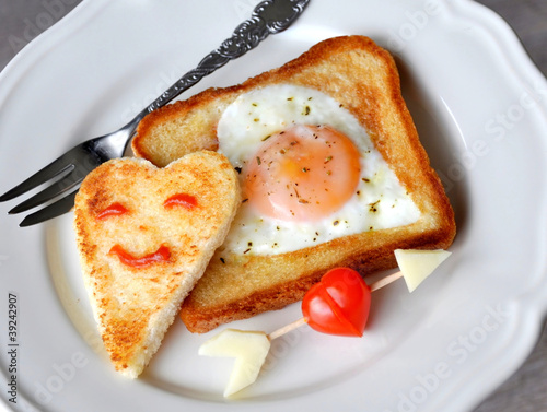Heart-shaped fried egg and toast