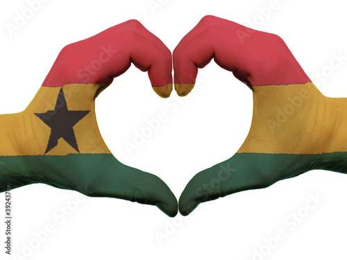 Heart and love gesture in ghana flag colors by hands isolated on