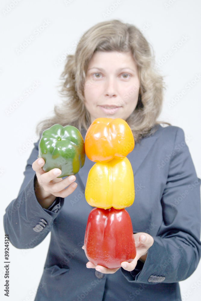 Fototapeta premium woman with colored peppers, healthy food photo