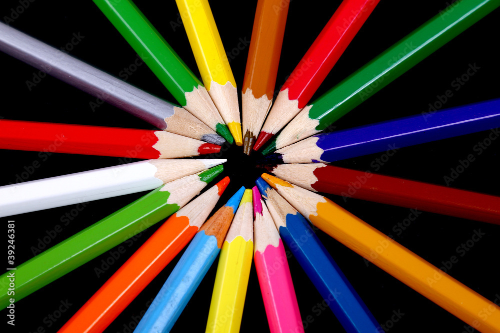 Assortment of coloured pencils with shadow on white/back backgro Assortment of coloured pencils with shadow on white/back backgro