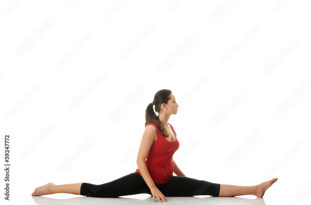 Young woman doing stretching exercise Young woman doing stretching exercise