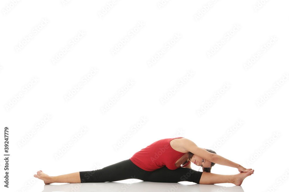 Young woman doing stretching exercise