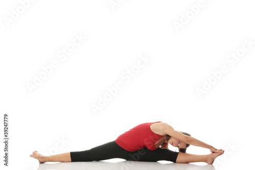 Young woman doing stretching exercise