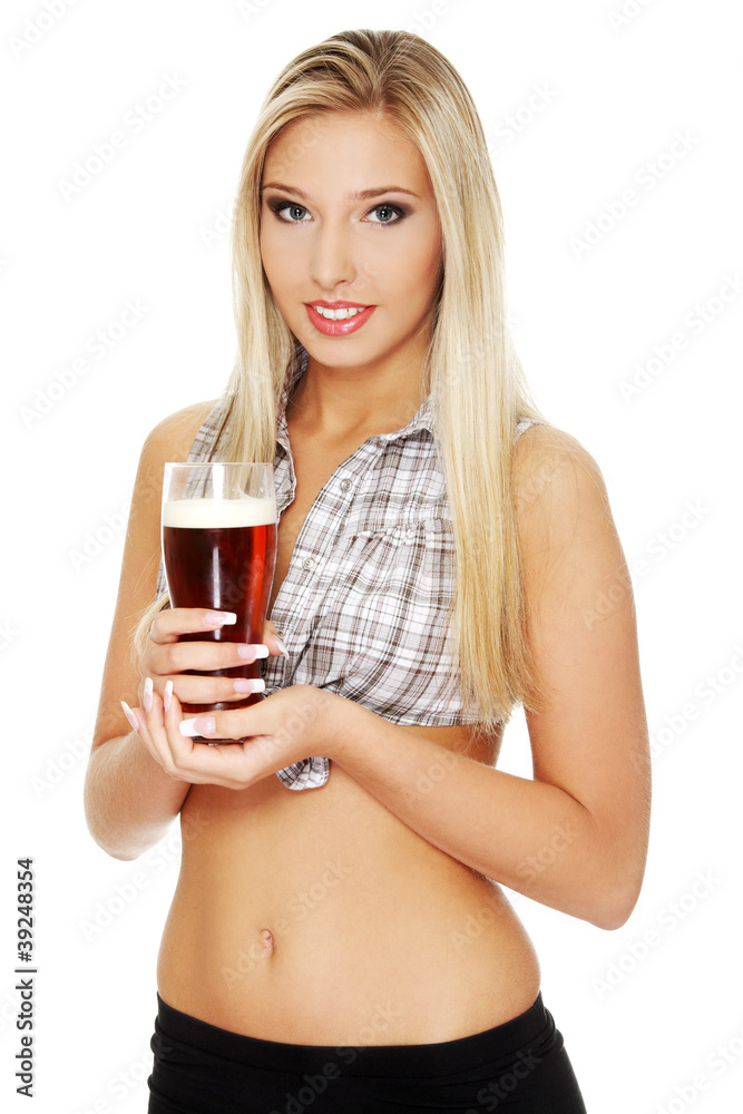 Sexy young blond woman holding glass of beer Sexy young blond woman holding glass of beer