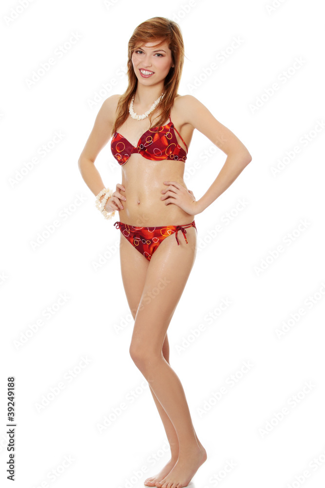 Young beautiful wet teen woman in bikini Stock Photo | Adobe Stock