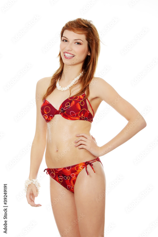 Young beautiful wet teen woman in bikini Stock Photo