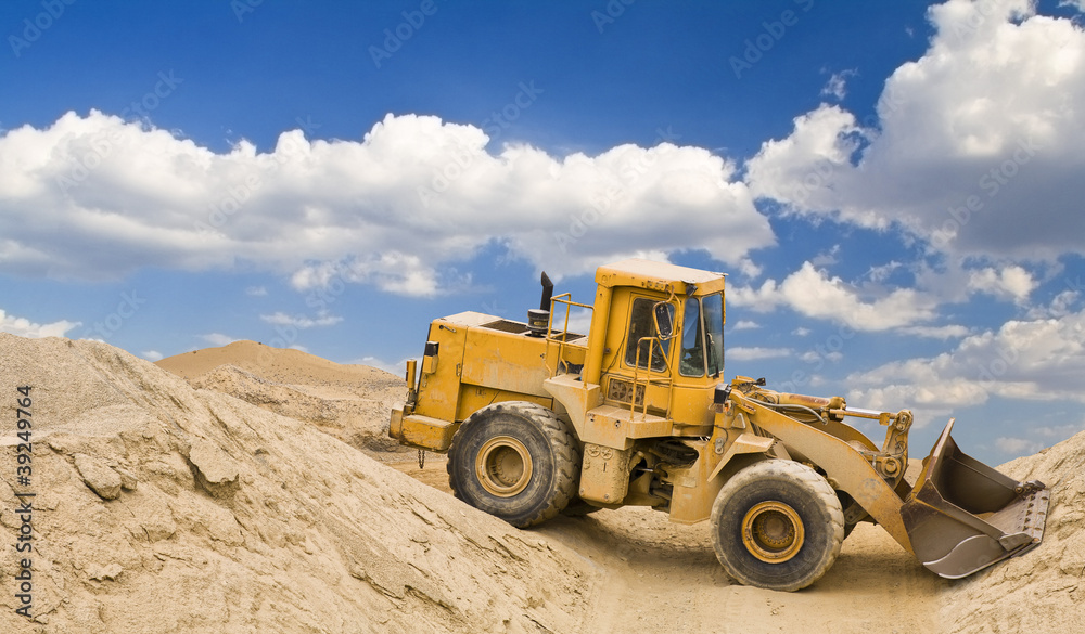 Excavator in quarry