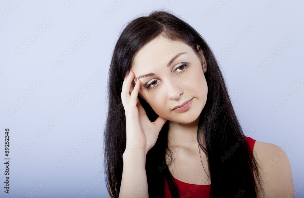 Fototapeta premium A sad and depressed brunette