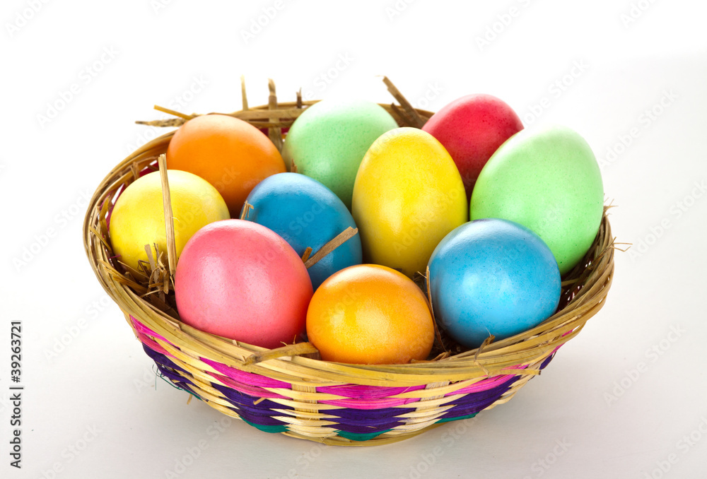 eastern eggs in different colours in a basket eastern eggs in different colours in a basket