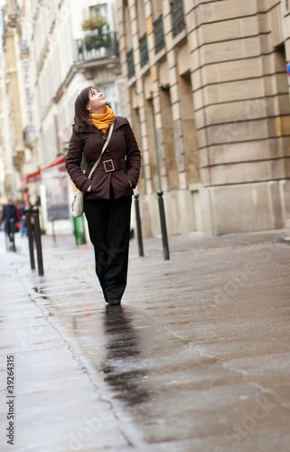 Young tourist in Paris at rainy day