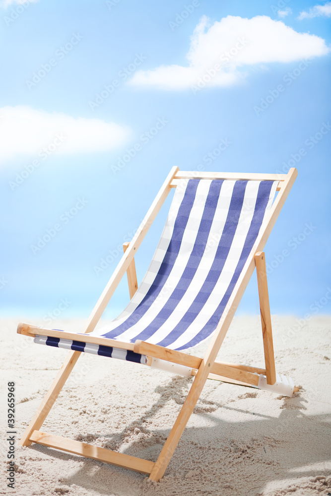 Deckchair standing at the sunny beach