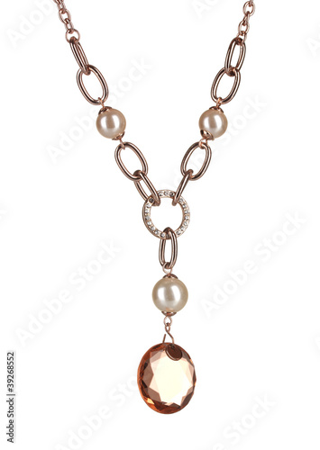 Pendant with an orange gem isolated on white