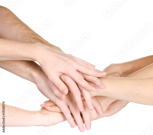 group of young people's hands isolated on white © Africa Studio