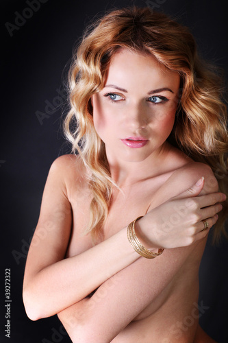 Portrait of beautiful blond woman wearing jewelry