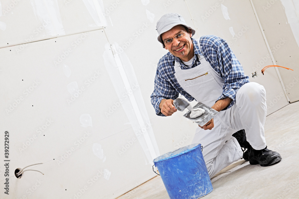 studwork: filling the joints of the plaster boards studwork: filling the joints of the plaster boards