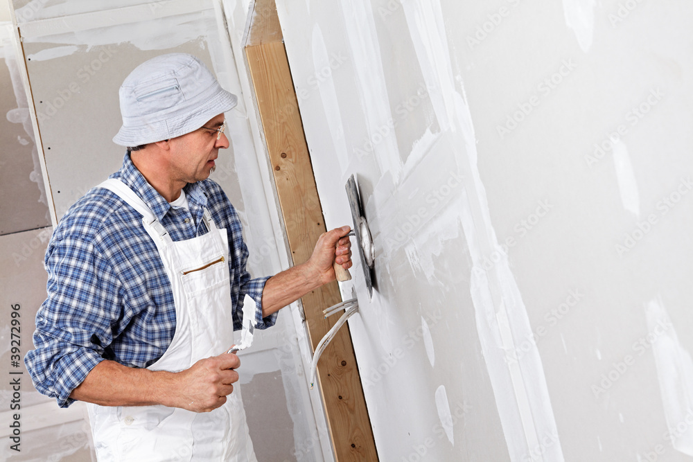 studwork: filling the joints of the plaster boards studwork: filling the joints of the plaster boards