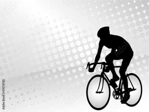 bicyclist on the abstract halftone background