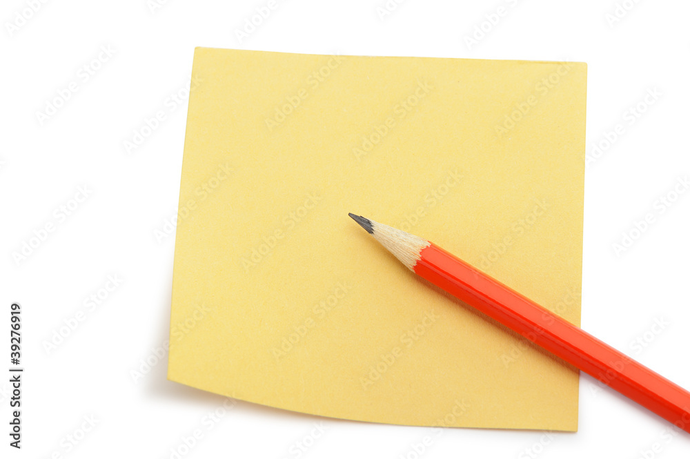 Paper note and a red pencil Paper note and a red pencil