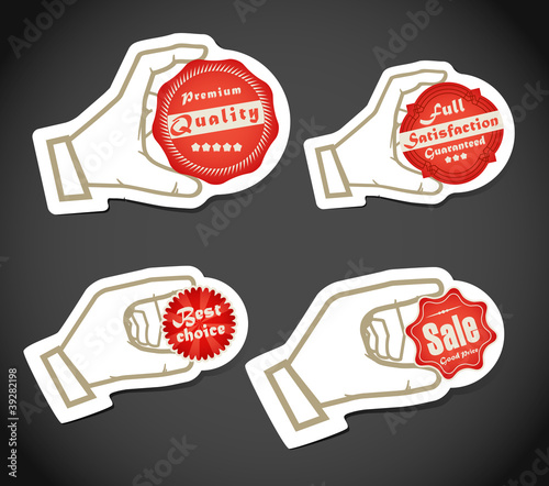 Shopping colorful discount labels in a hand