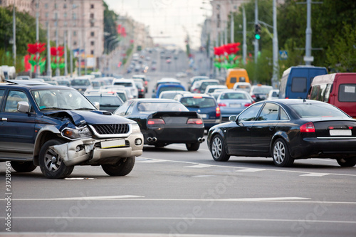 car got in an accident on the background of a large traffic jam © Mikalai Bachkou