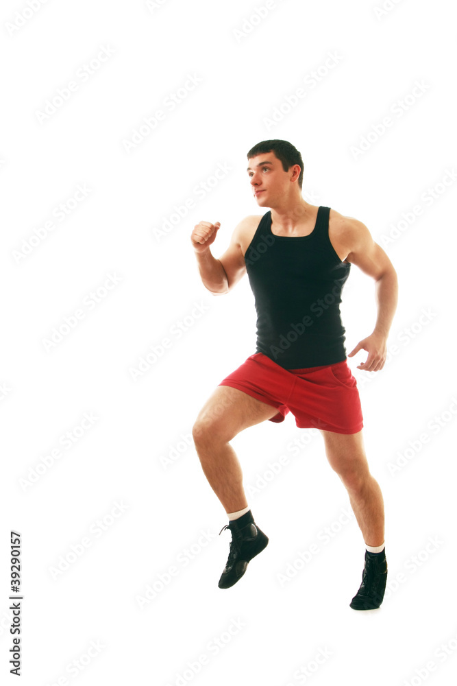 Full length portrait of a male athlete running