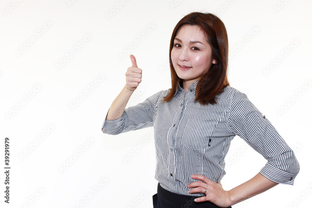 ガッツポーズをしている笑顔のオフィスレディー ガッツポーズをしている笑顔のオフィスレディー