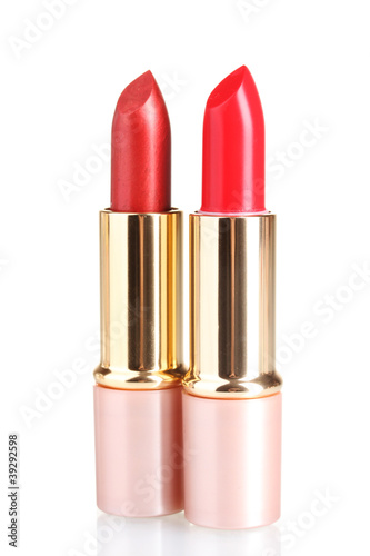 beautiful red lipsticks isolated on white