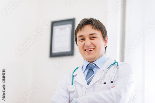 Portrait of happy medical doctor