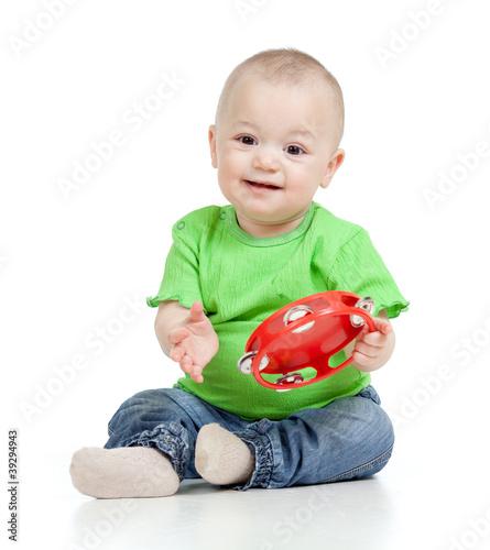 Baby playing with musical t...