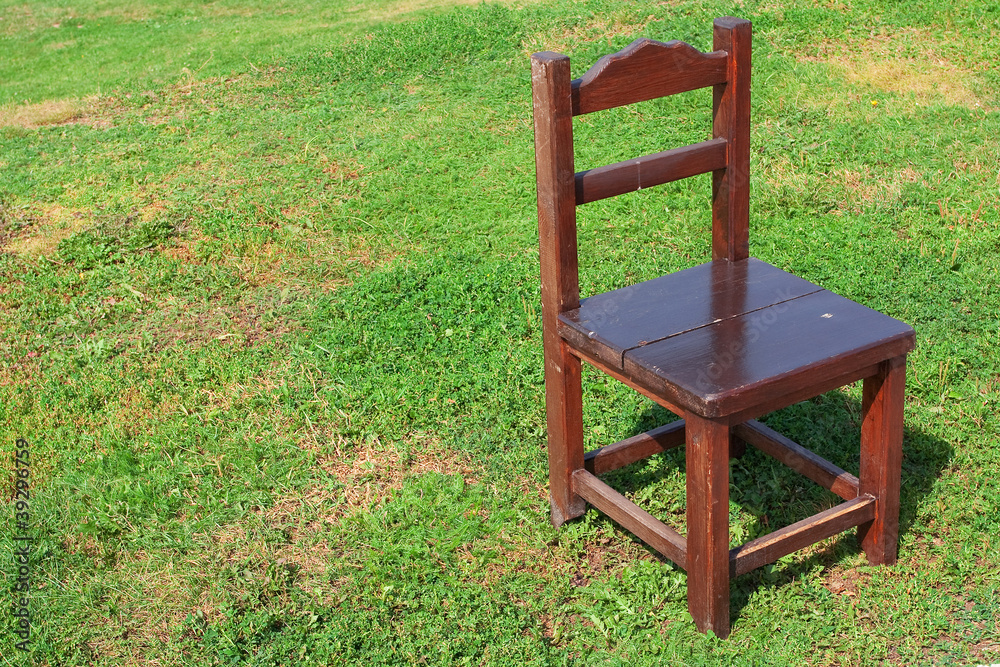 Wooden chair on the lawn