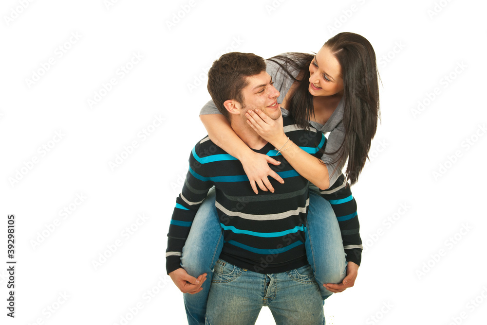 Joyful couple in piggy back Joyful couple in piggy back