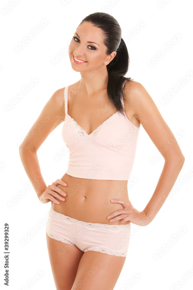 Pretty tanned woman in lingerie isolated on white background Pretty tanned woman in lingerie isolated on white background