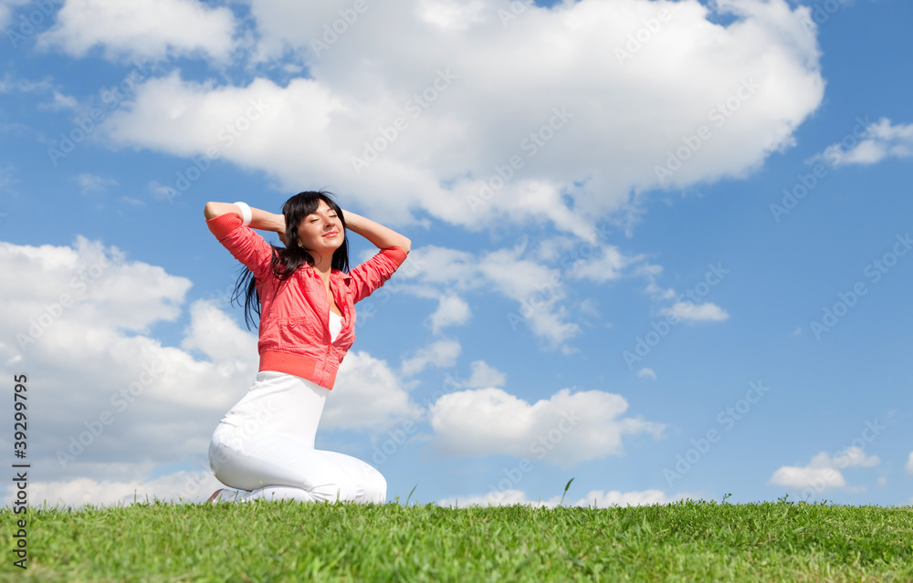 happy young woman rest on the green grass happy young woman rest on the green grass