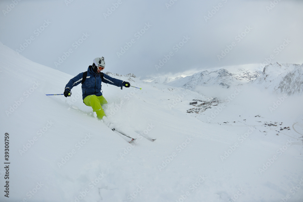skiing on fresh snow at winter season at beautiful sunny day skiing on fresh snow at winter season at beautiful sunny day