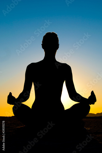 woman in yoga lotus position