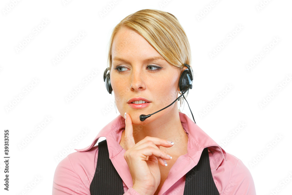 Portrait of thoughtful woman employee in headset