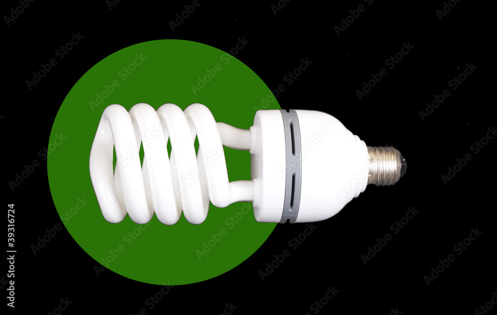 Energy-saving lamp isolated on black bac