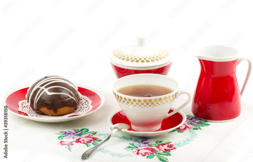 Beautiful tea set with cupcakes