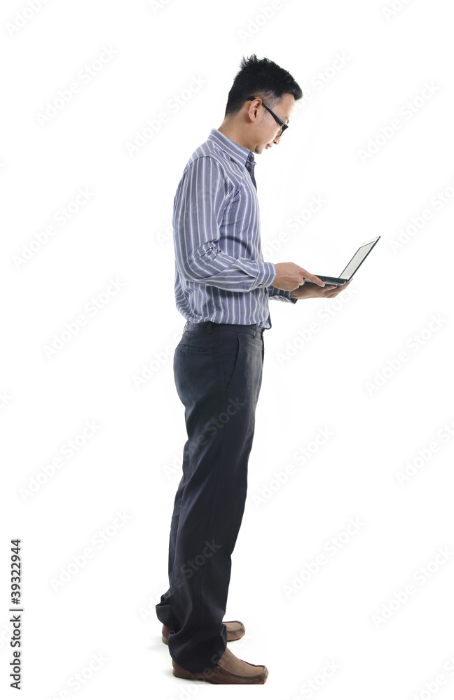 Young businessman use laptop on white background. Young businessman use laptop on white background.