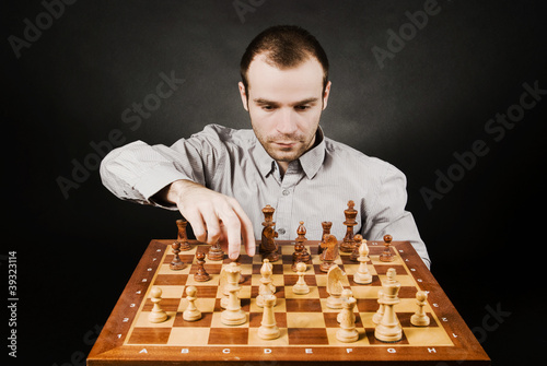 Man at chess board