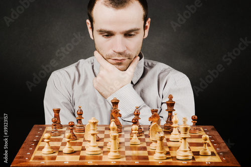 Man at chess board