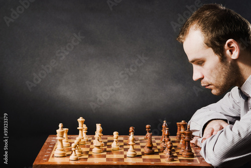 Man at chess board