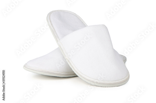 A pair of white slippers photo