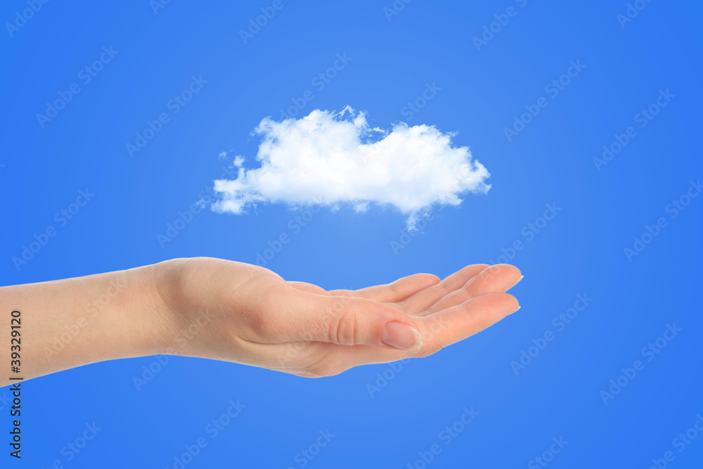 Hand and a white cloud concept for background Hand and a white cloud concept for background